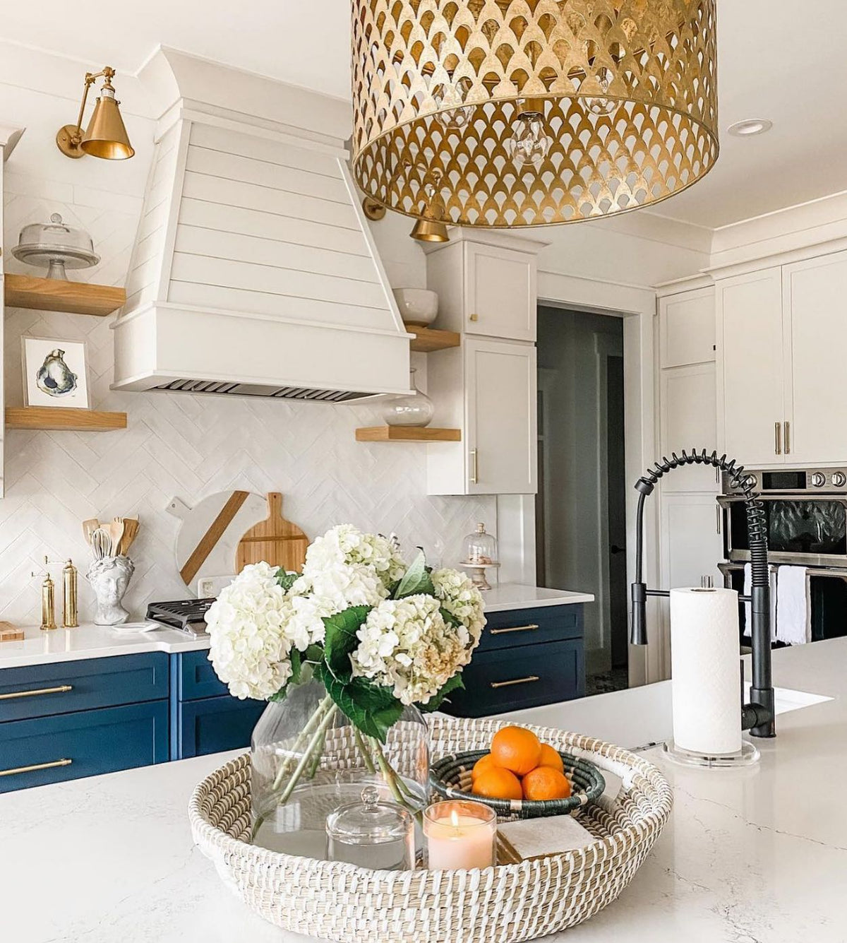 Low Country oyster print on open shelves in a white kitchen
